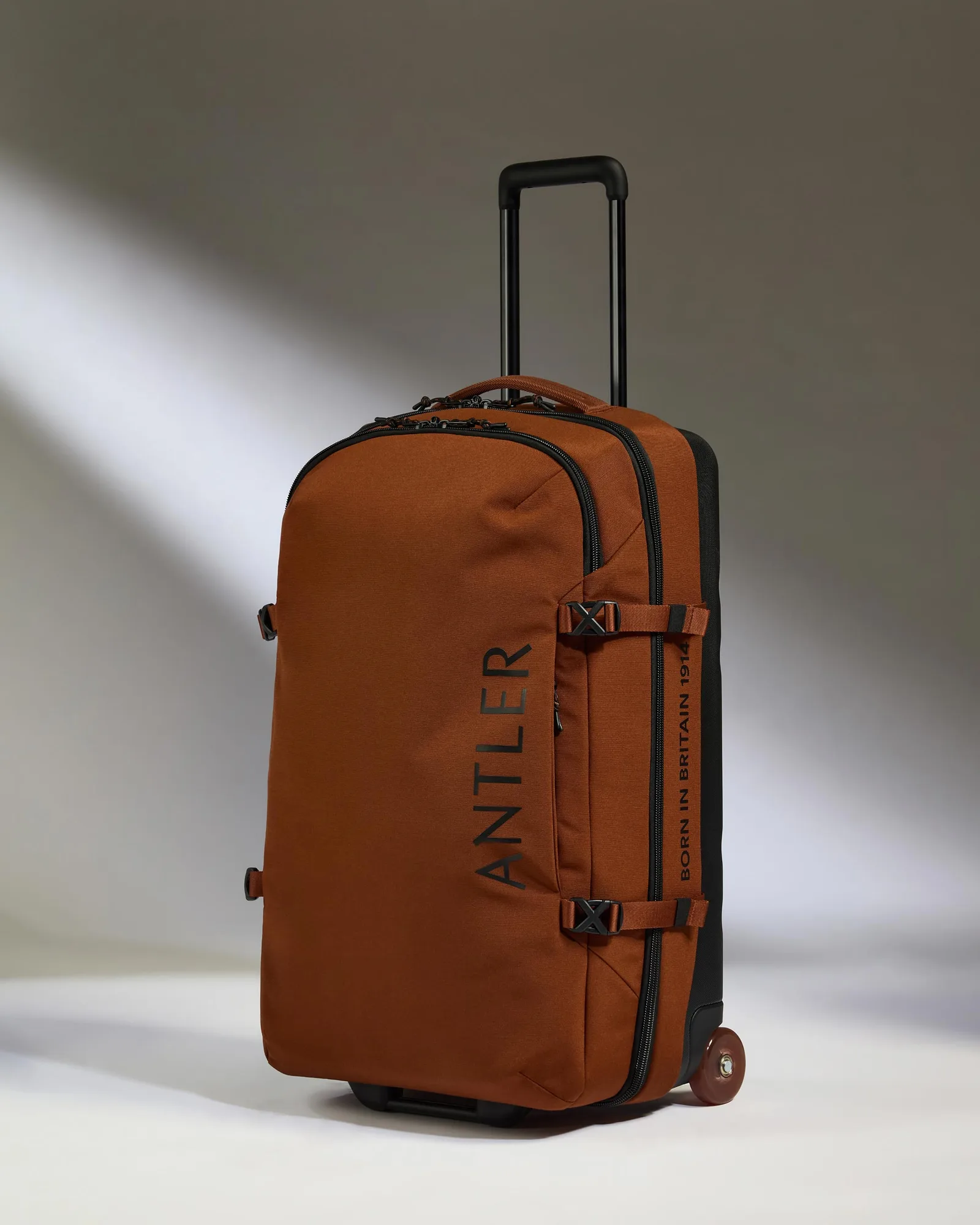 Discovery Wheeled Duffel in Clay Brown
