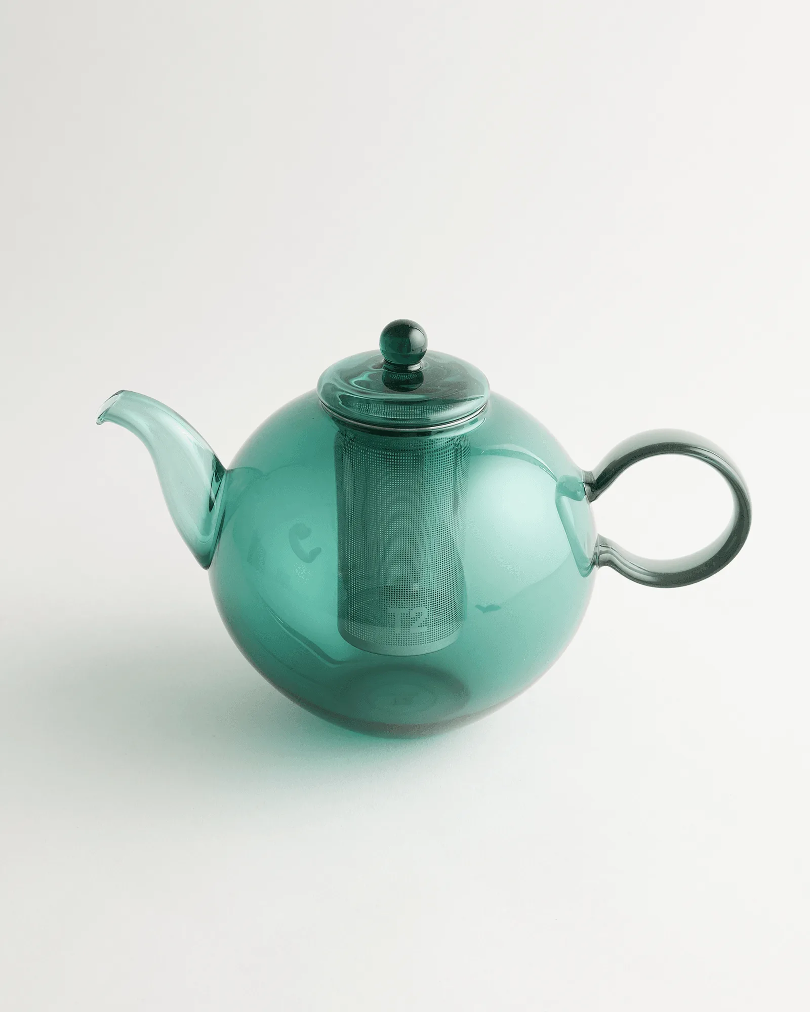 Lung Ching vs Oolong Pêche-Abricot : Quel thé en vrac l'emporte ?