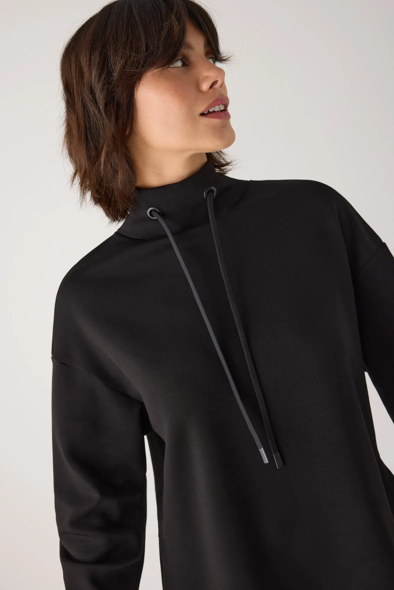 Como cuidar de uma camisola de gola alta em fleece