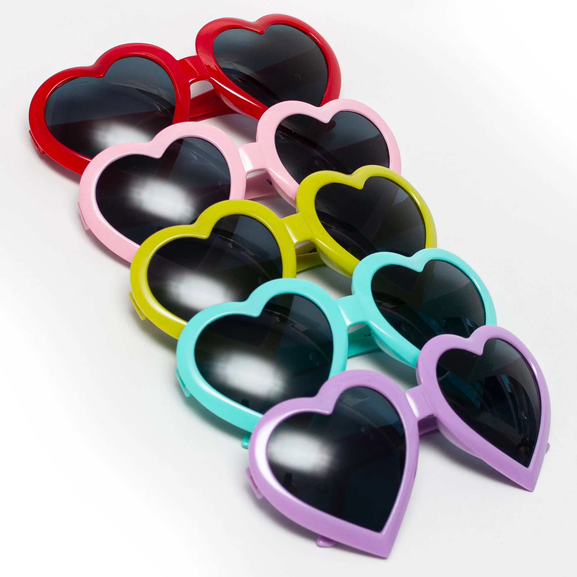Gafas de sol de corazón vs. ojo de gato: ¿qué forma te favorece?