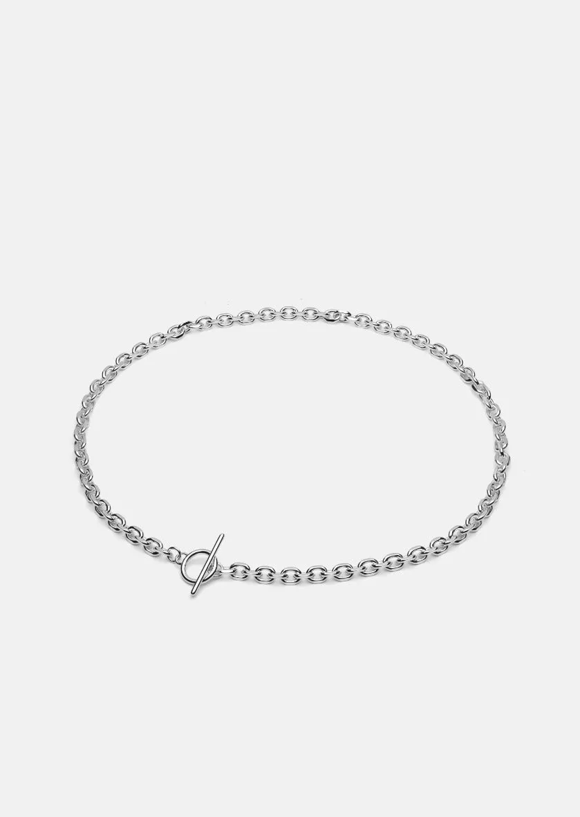 Cómo combinar una cadena de plata con un colgante de oro