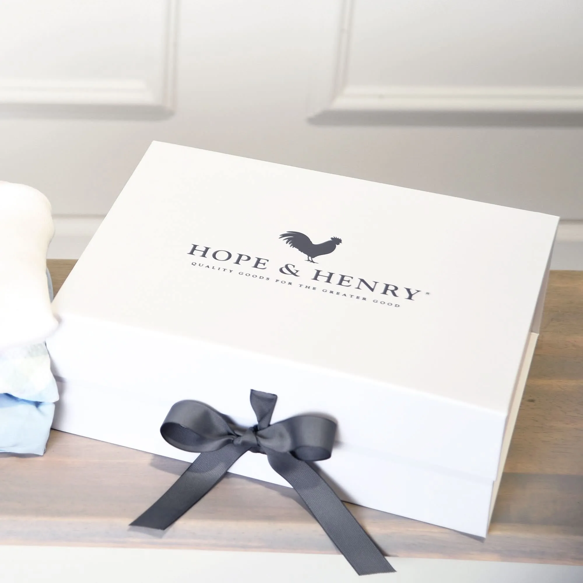 How to Wrap a Baby Gift Box with Clothes