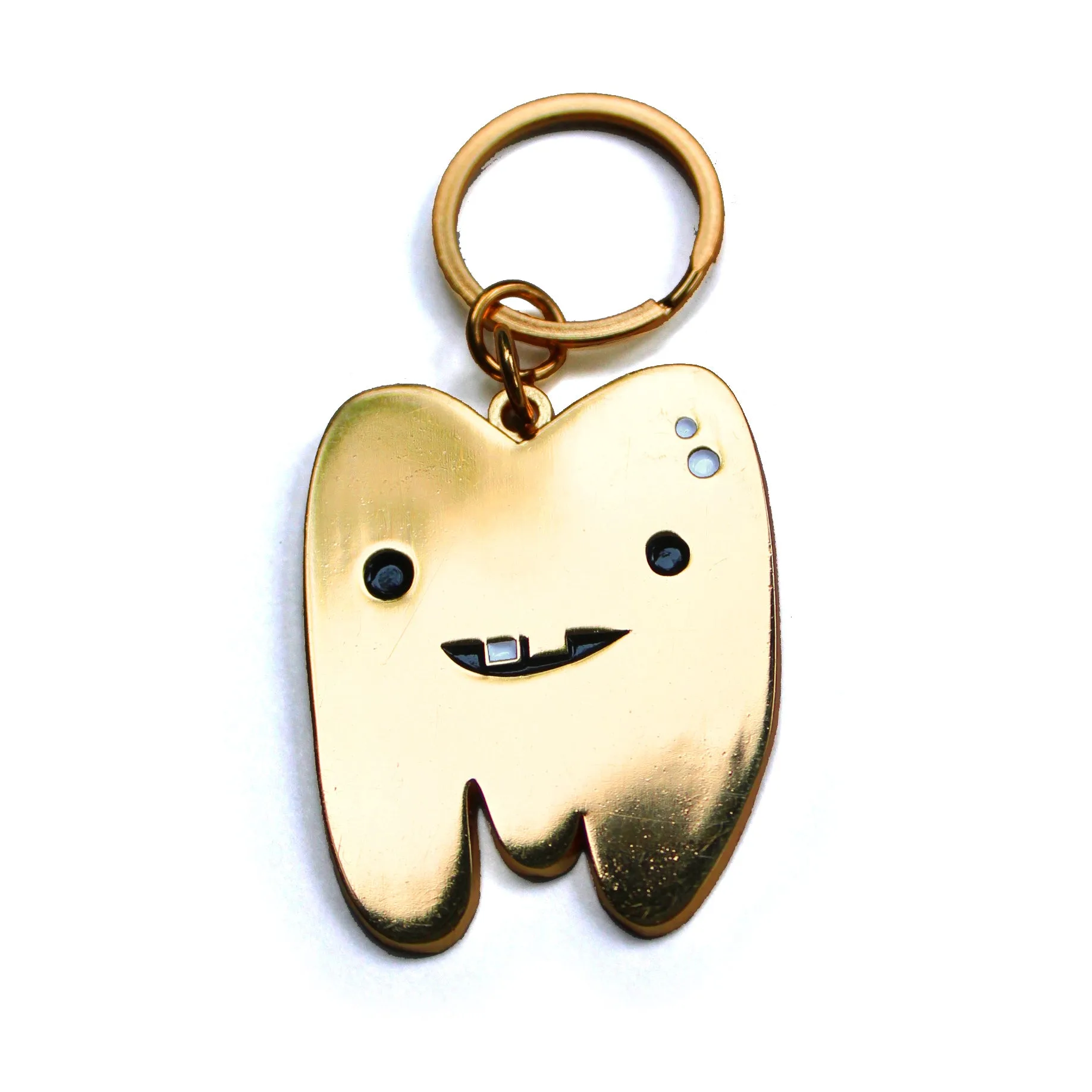 Gold Tooth Schlüsselanhänger: Bedeutung und Geschenkideen