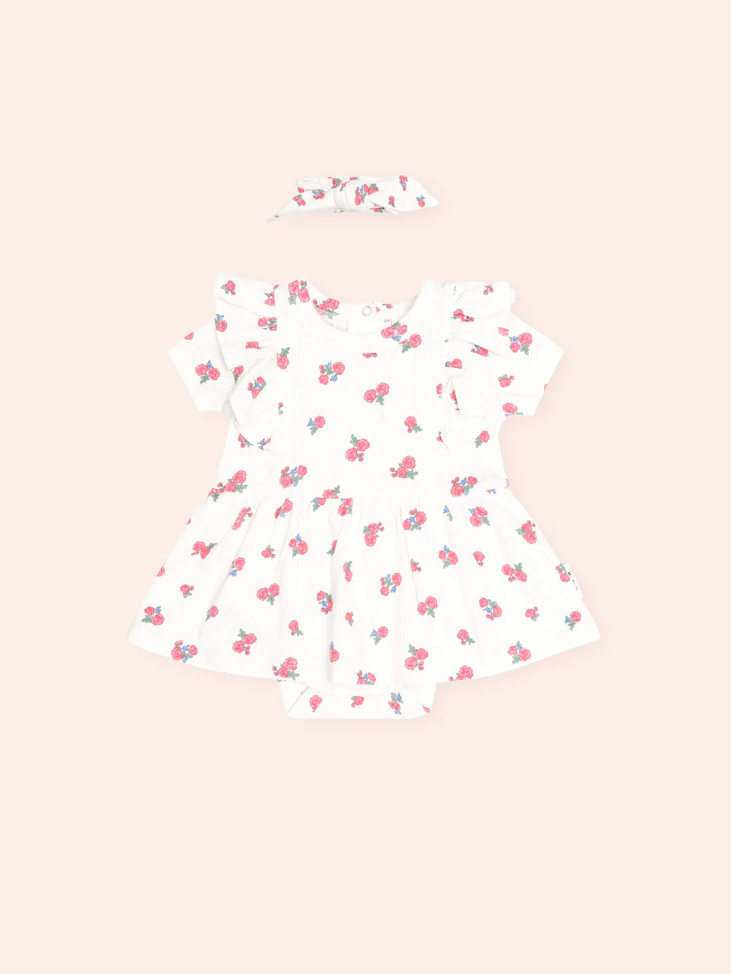 Combinaison florale pointelle vs. Body rayé Peekaboo