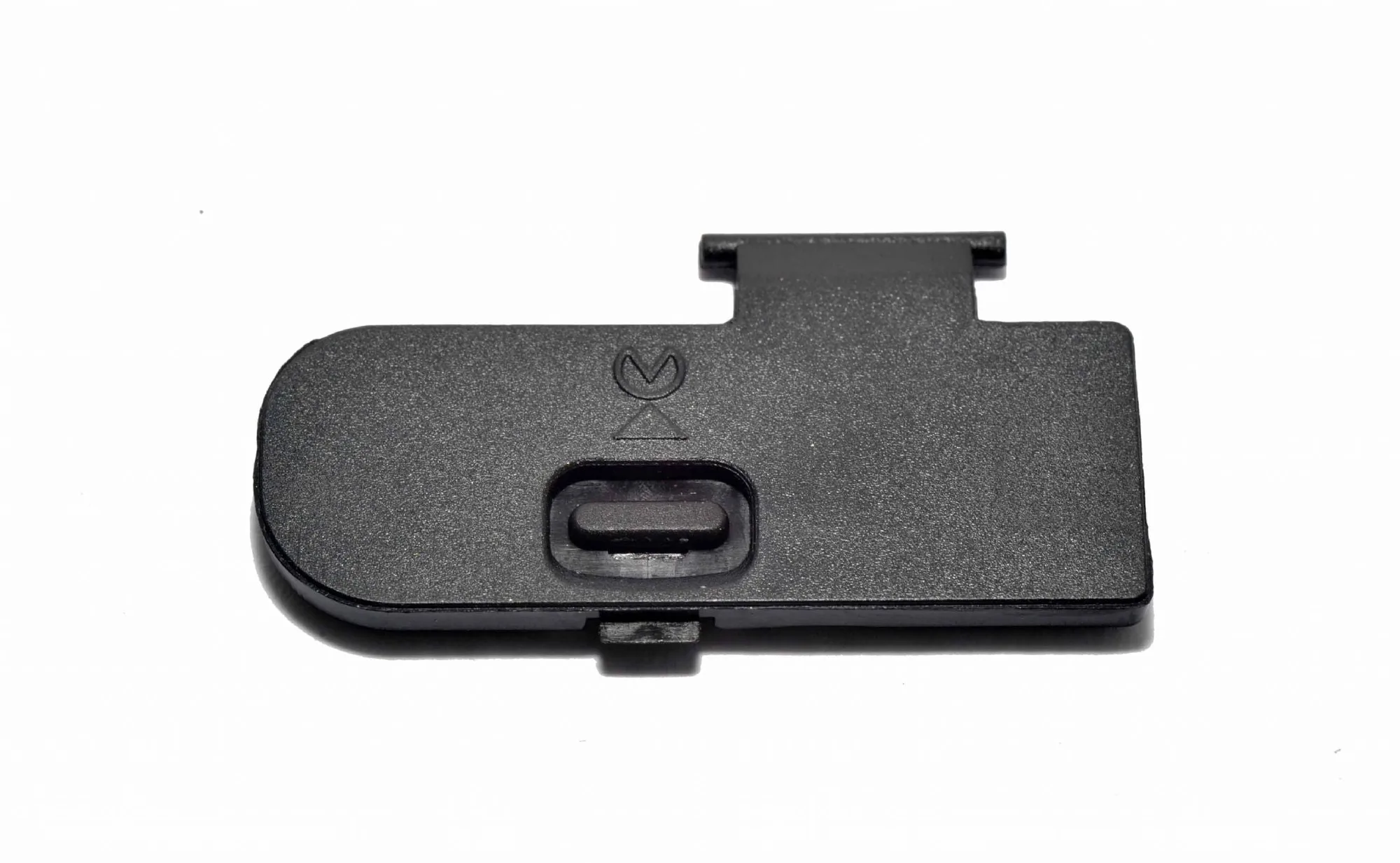 Comment remplacer le couvercle du logement de batterie d'un Nikon D5100