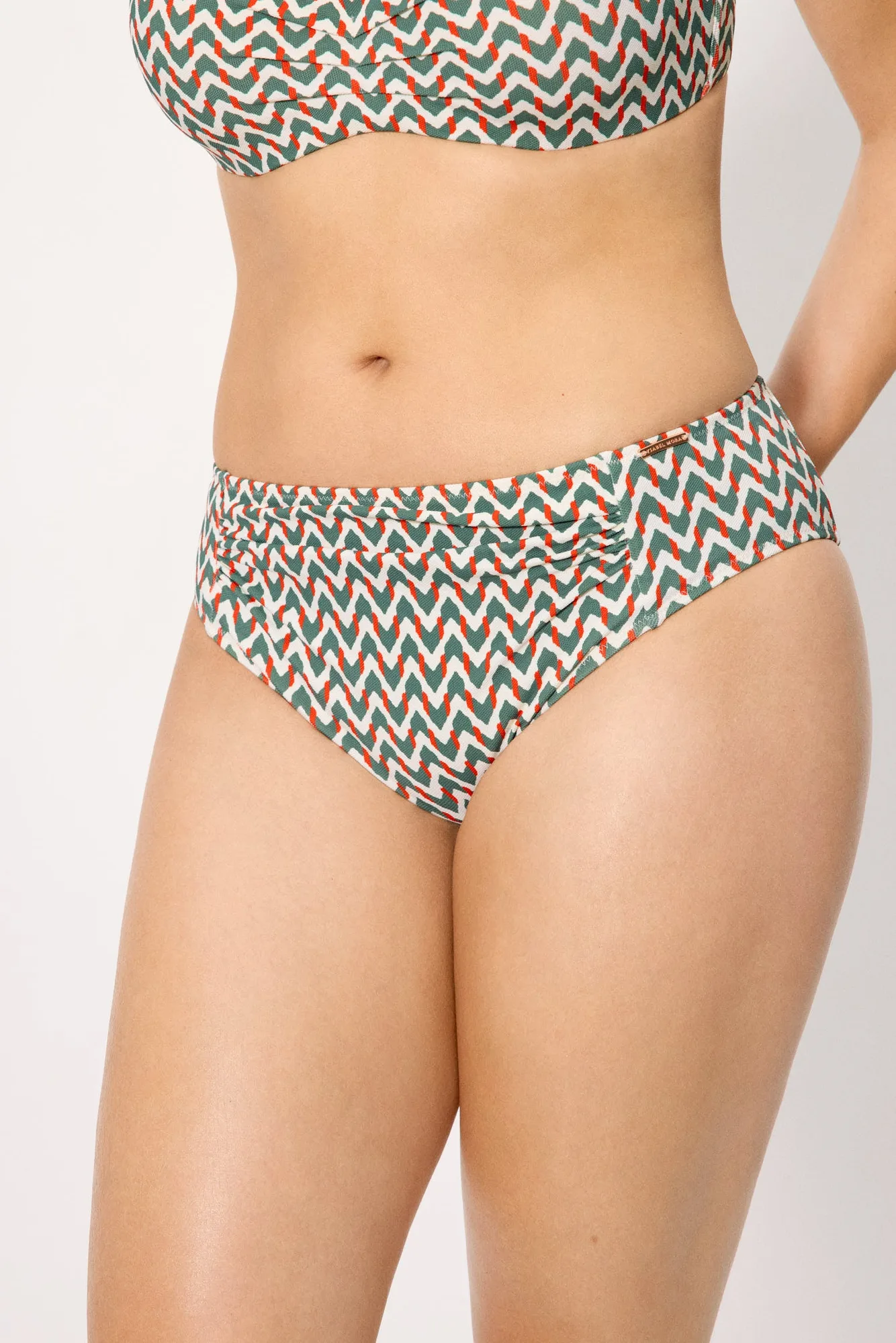 Braga bikini moldeadora midi micropiqué estampado verde botella