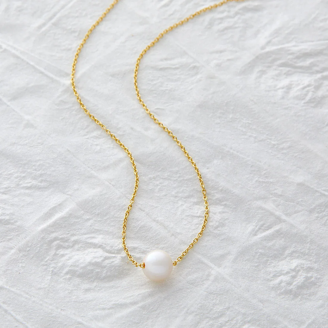 A MOMENT IN TIME NECKLACE
