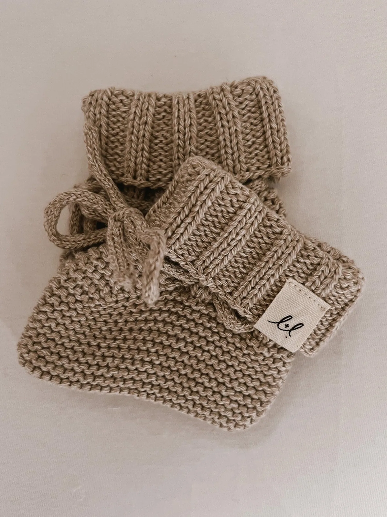 Baby Socks vs. Booties vs. Tights: Age-by-Age Guide