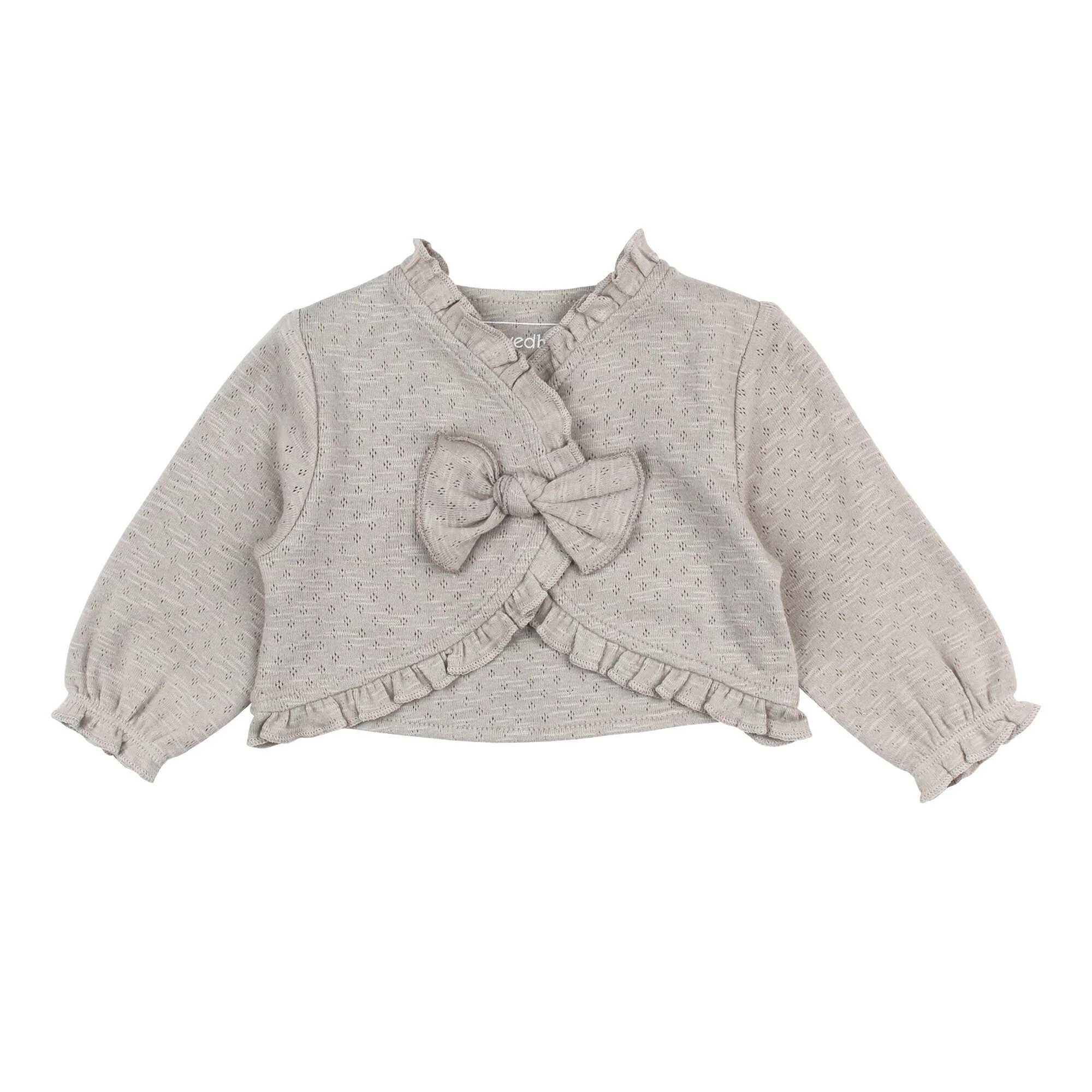 Comment porter un pull en pointelle bio à volants pour l'automne