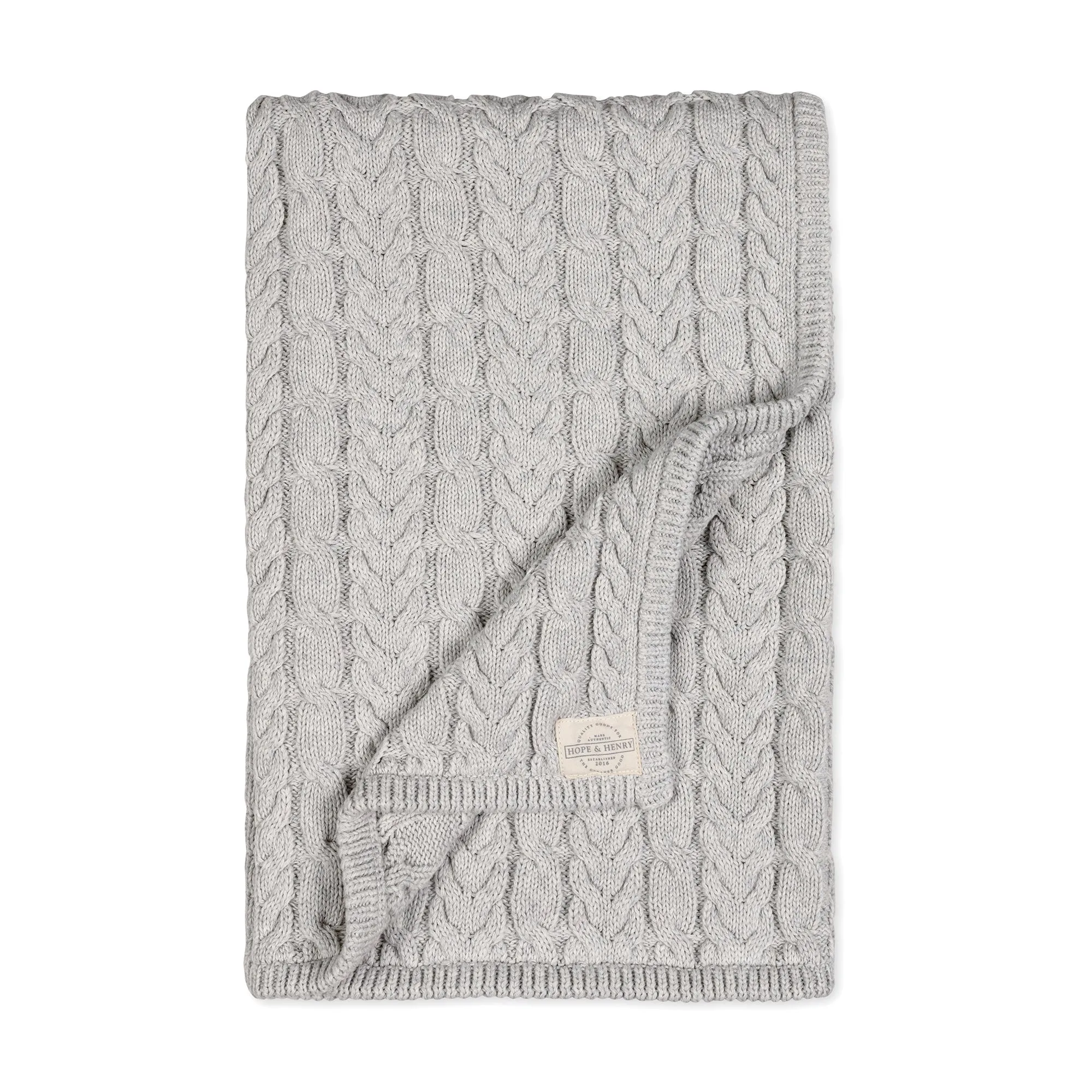 Organic Cable Knit vs. Jacquard Sweater Blanket