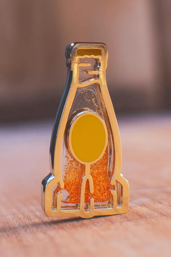 Épingle Nuka Orange scintillante Fallout