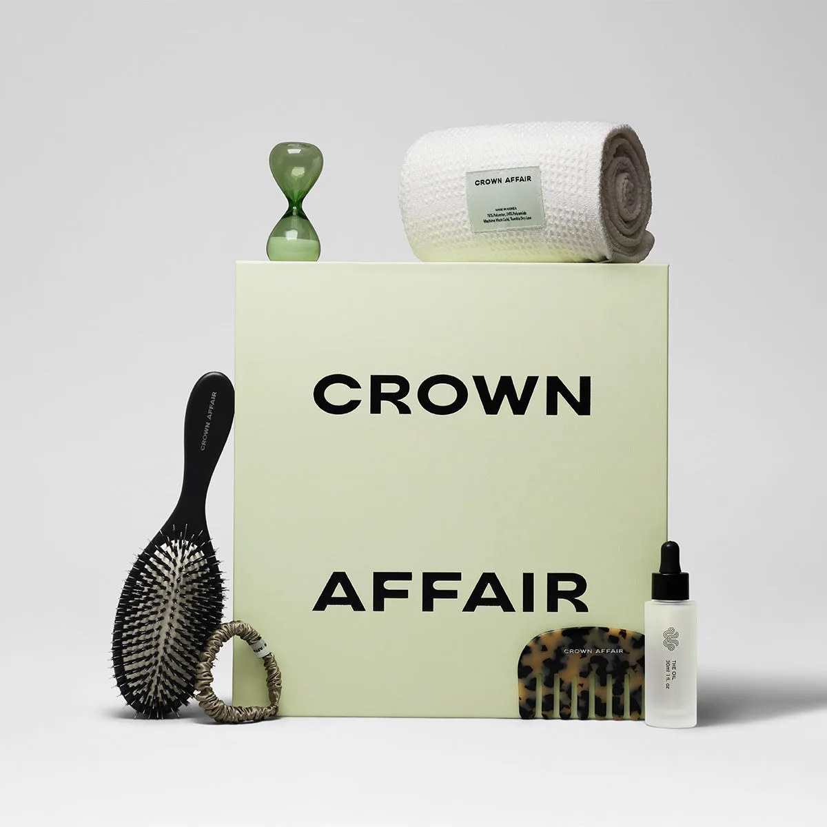 The Hydration To-Go Set vs. The Set: Which Crown Affair Travel Set Is Best for Your Hair?